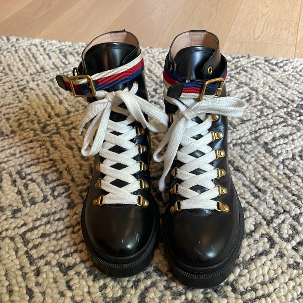 Gucci leather lug sole boots.